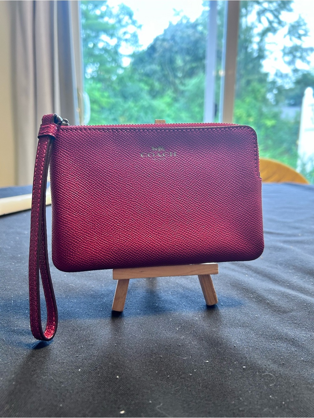 Coach Pebbled Leather Wristlet in Burnt Orange Metallic